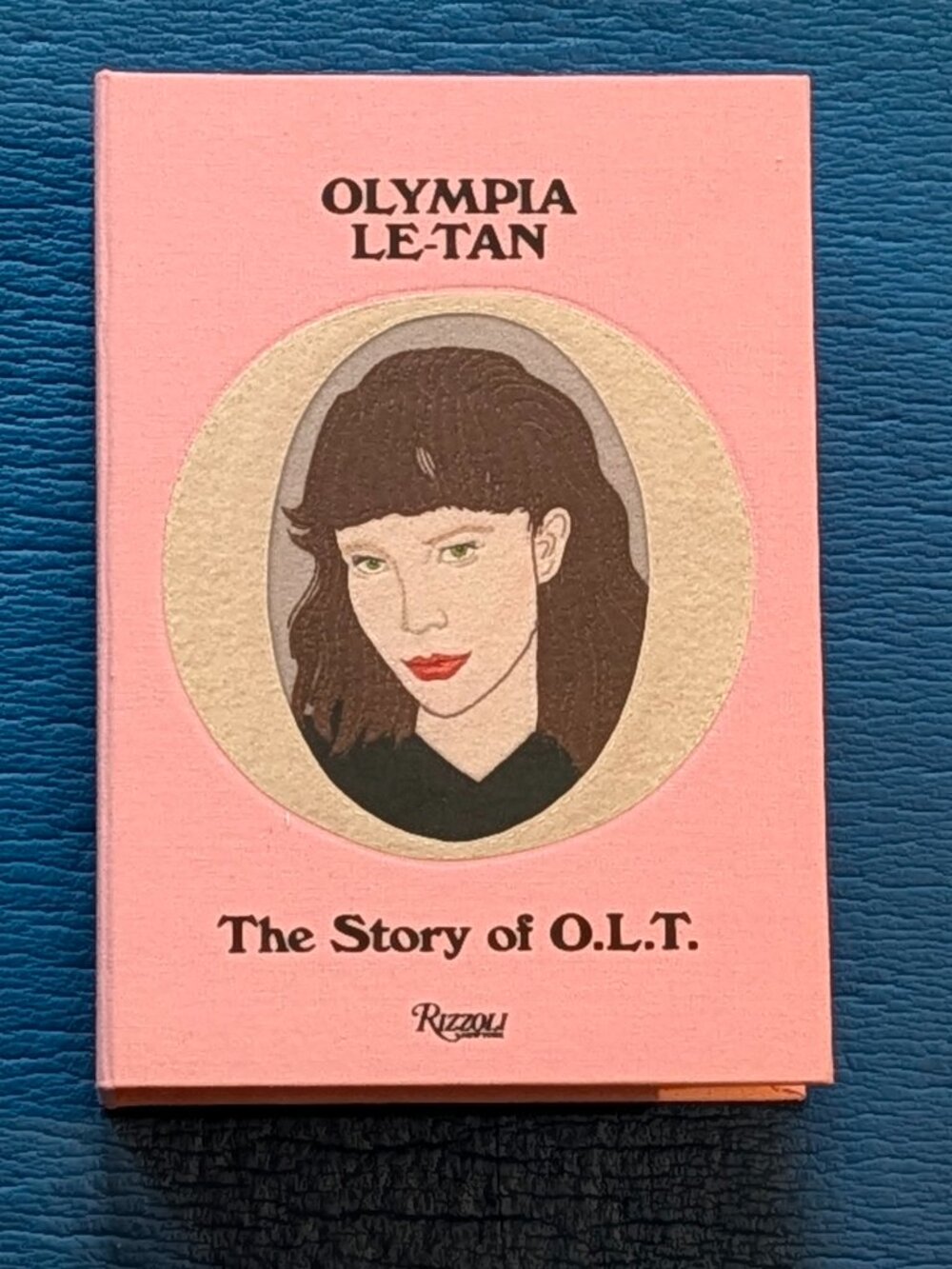 Olympia Tan, The Story of O.L.T., New